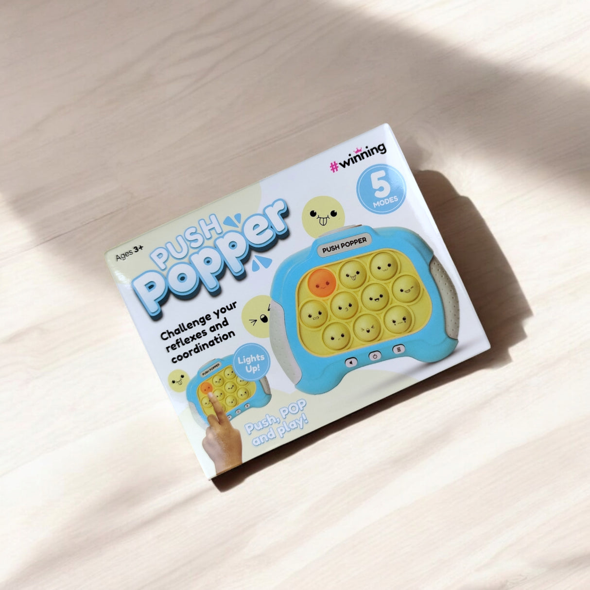 Push Popper Fidget Toy Spielzeug in Blau mit Licht und Sound