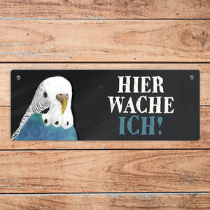 Metallschild mit Wellensittich blau Motiv und Spruch: Hier wache ich!