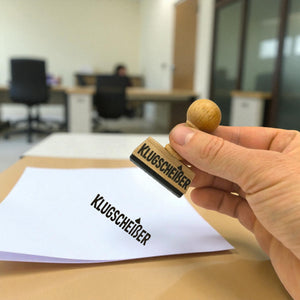 Klugscheißer Holzstempel