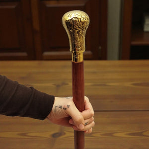 Blattornament Spazierstock aus Holz mit goldenem Griff aus Metall