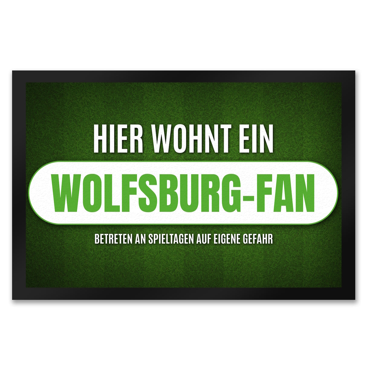 Hier wohnt ein Wolfsburg-Fan Fußmatte mit Rasen Motiv