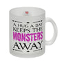 Kaffeetasse für Halloween mit Spruch - A hug a day keeps the monsters away