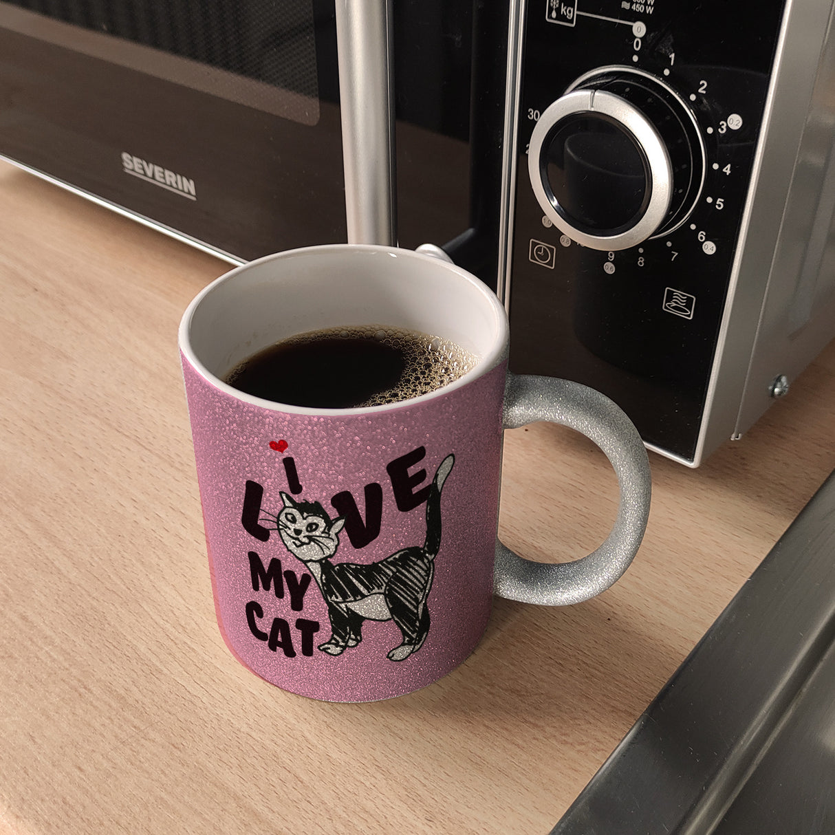 Ich liebe meine Katze Kaffeebecher mit Katzen Motiv und Rosa Hintergrund