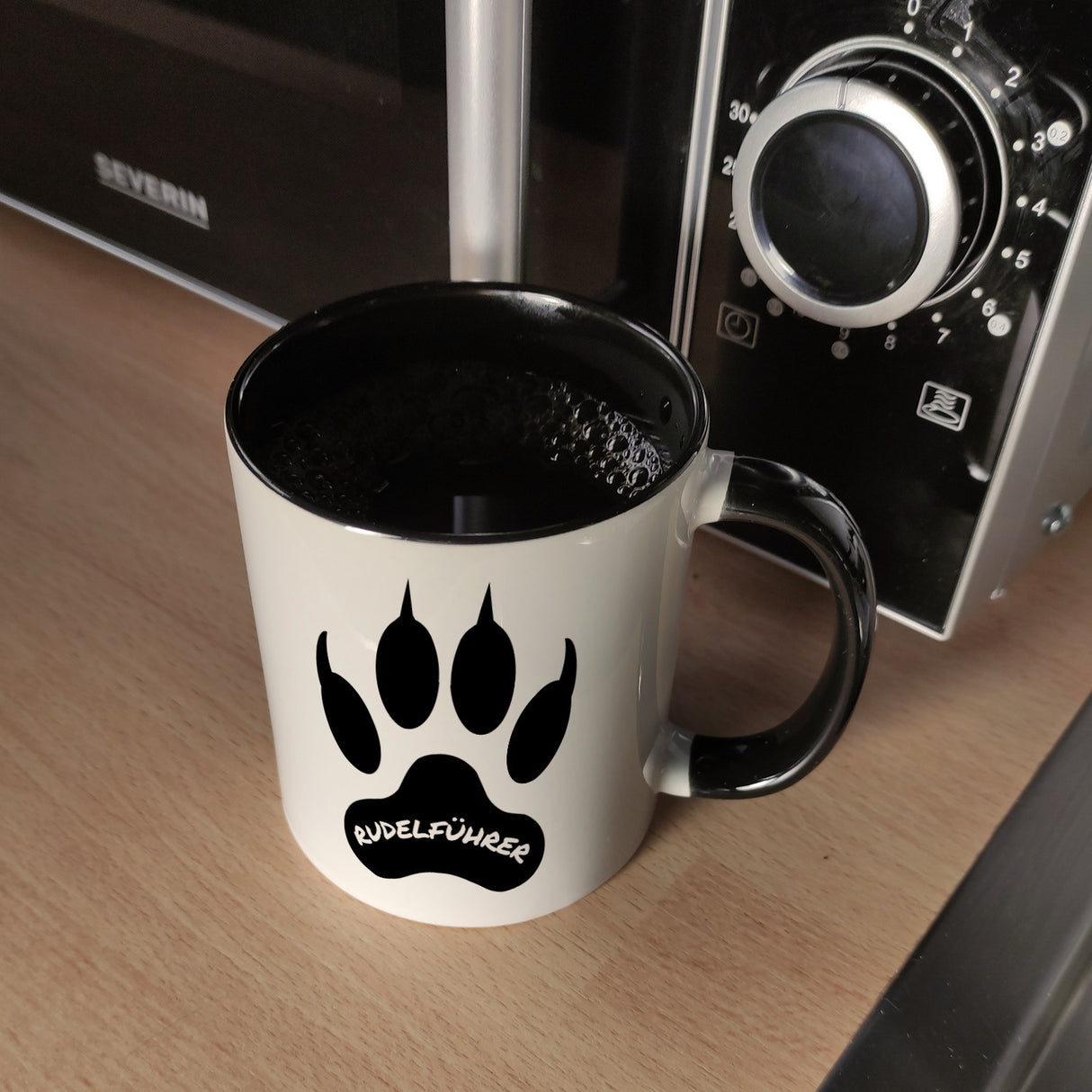 Rudelführer Pfotenabdruck Kaffeebecher mit Wolf Motiv