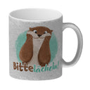 Lachender Otter Kaffeebecher mit Spruch Bitte lächeln