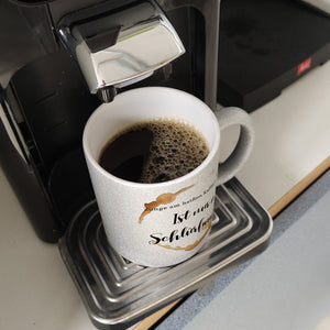 Kaffeefleck Kaffeebecher mit Spruch Zunge am heißen Kaffee verbrannt