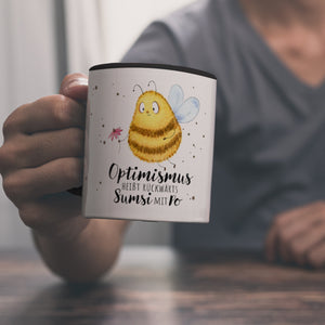 Pummel Biene Kaffeebecher mit Spruch Optimismus heißt rückwärts Sumsi mit Po