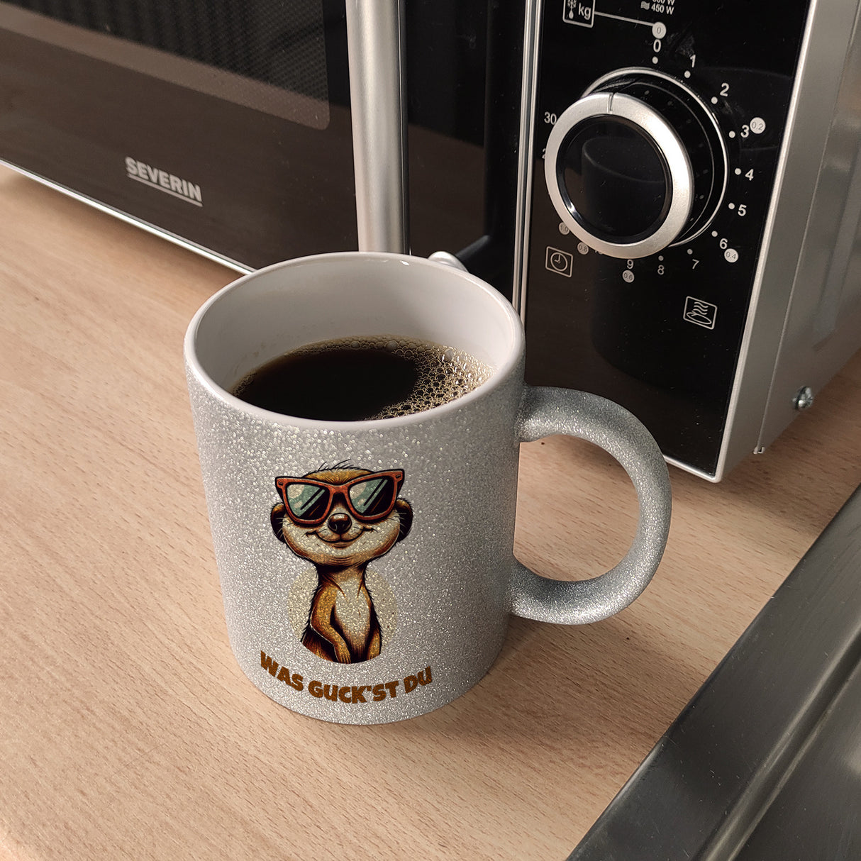 Erdmännchen Geschenke Kaffeebecher mit Spruch Was guckst du