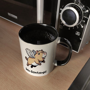 Comic Capybara mit Flügeln Kaffeebecher mit Spruch Dein Schutzengel