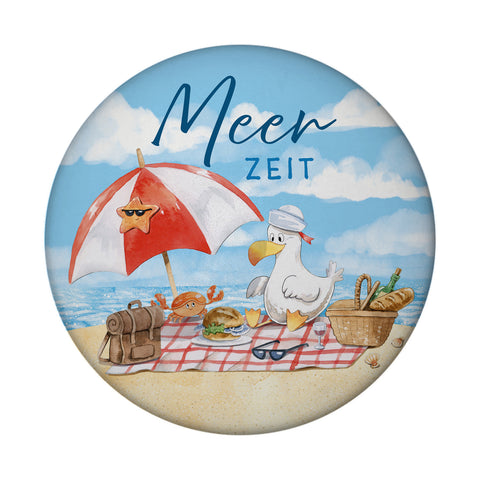 Möwe am Strand Magnet rund mit Spruch Meerzeit