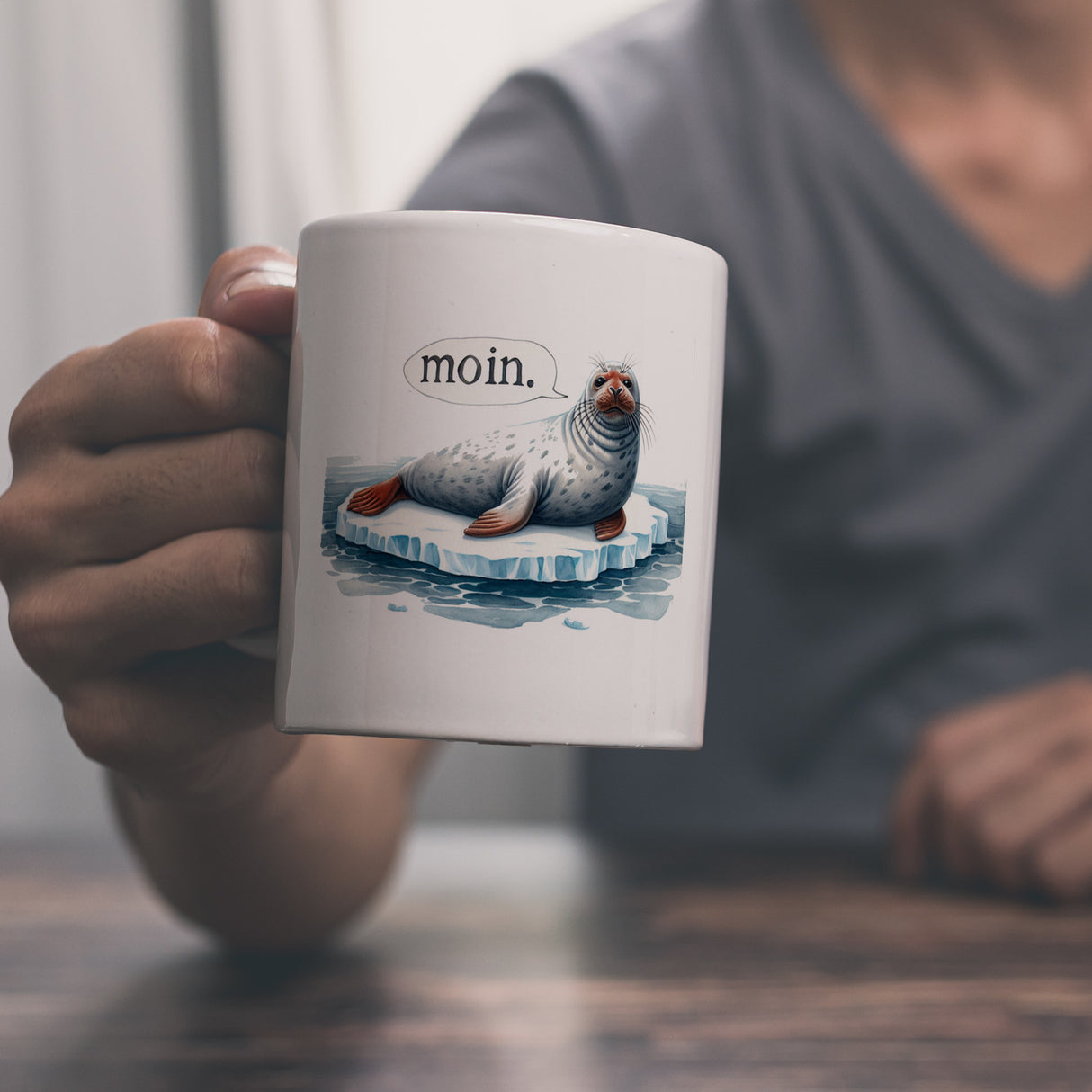 Robbe auf Eisscholle Kaffeebecher mit Spruch Moin