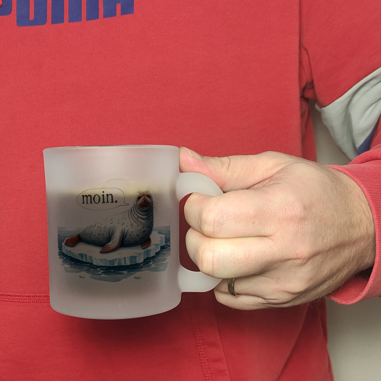Robbe auf Eisscholle Kaffeebecher mit Spruch Moin