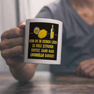 Kaffeebecher mit Spruch Mach Limoncello aus vielen Zitronen gelb schwarz