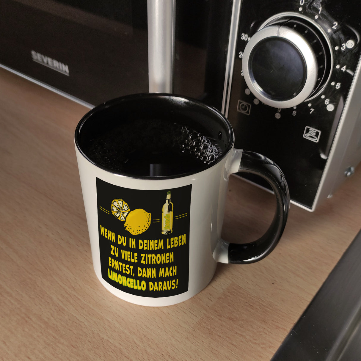 Kaffeebecher mit Spruch Mach Limoncello aus vielen Zitronen gelb schwarz