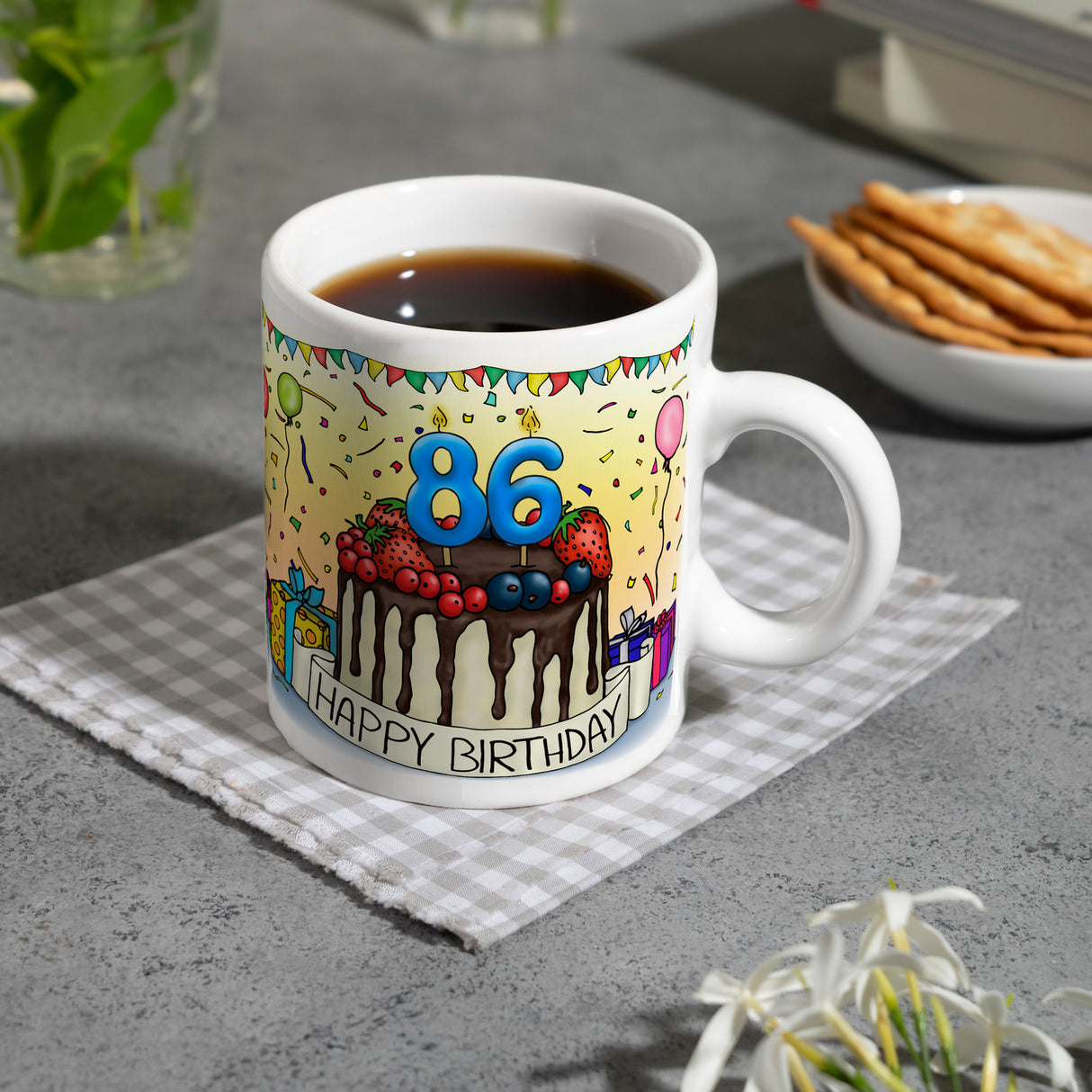 86. Geburtstag Tasse mit Kuchen und Geschenk und Anhänger: zum 31412. Tag
