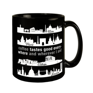 Metropolen Tasse in Schwarz mit Spruch: Coffee tastes good everywhere!