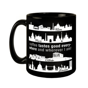 Metropolen Tasse in Schwarz mit Spruch: Coffee tastes good everywhere!