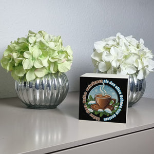 dampfende Kaffeetasse Spardose mit Spruch: Kaffee aufwärmen, statt Schnee gestern