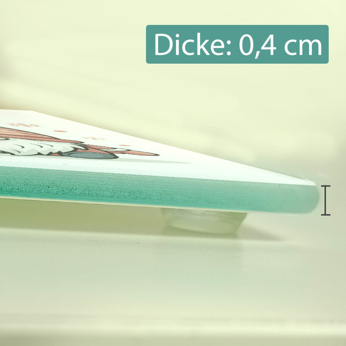 Weihnachtswichtel mit Geschenk Schneidebrett aus Glas Weihnachten