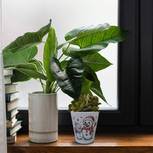 Cartoon Schneemänner Schneeflocken Blumentopf