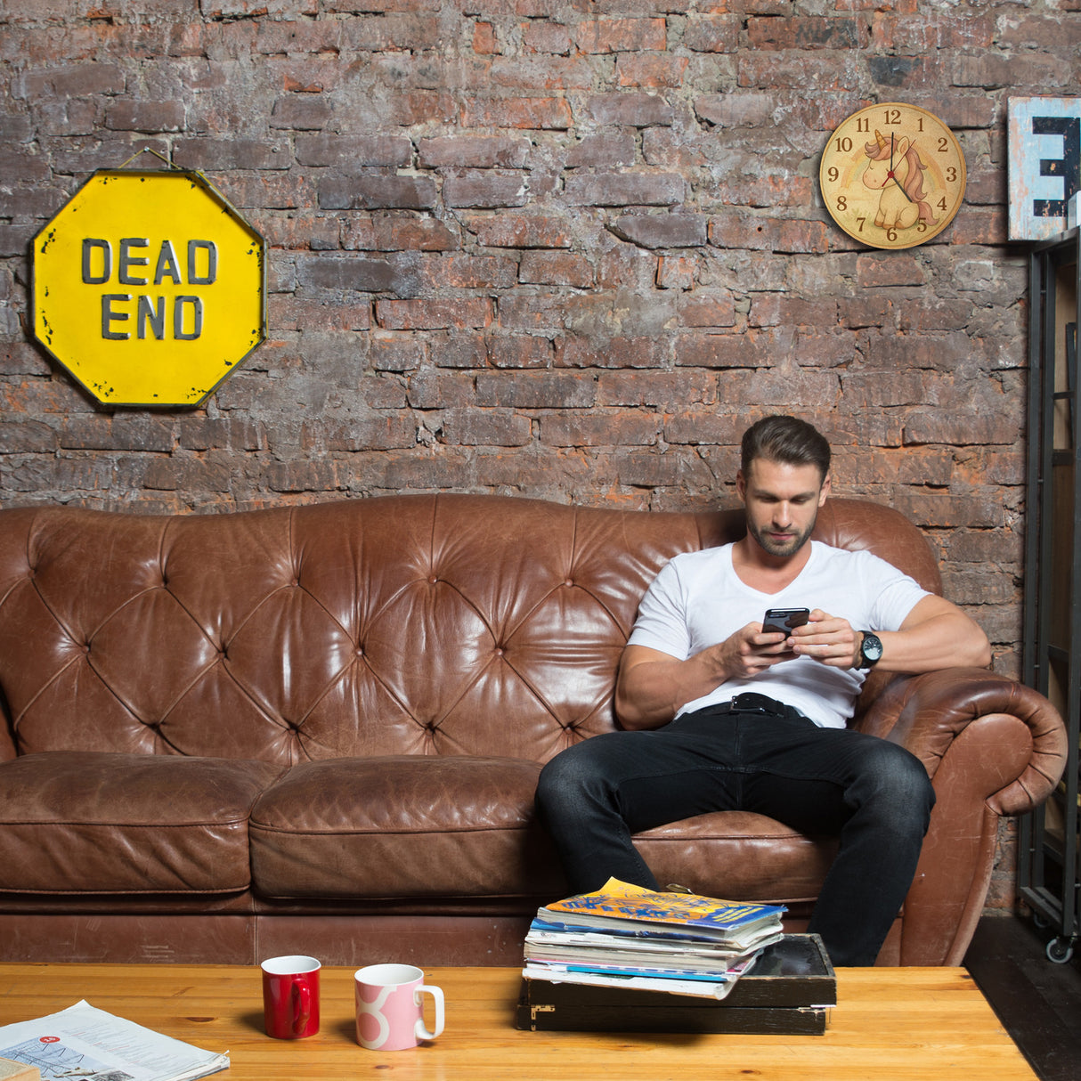 Cartoon Einhorn mit Regenbogen Wanduhr