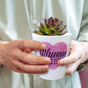 Blumenliebe mit rosa Herzen Blumentopf