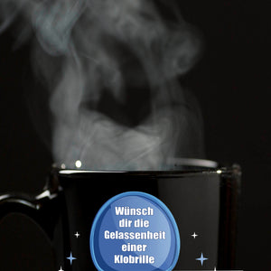 Klobrille Tasse in Schwarz mit Spruch: Gelassenheit wie eine Klobrille haben