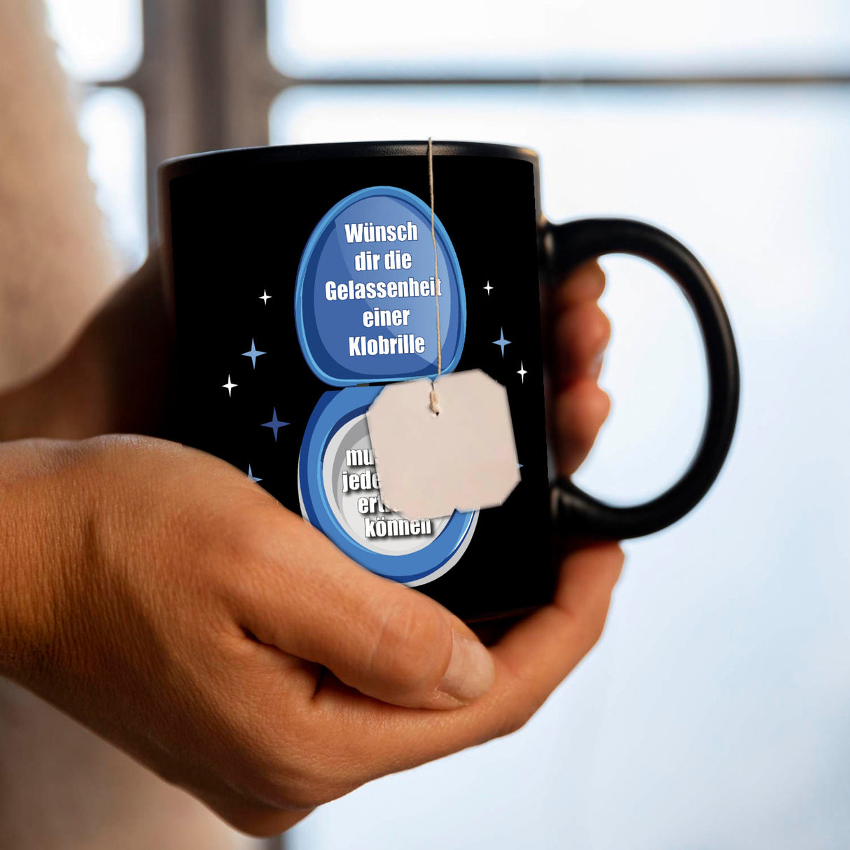 Klobrille Tasse in Schwarz mit Spruch: Gelassenheit wie eine Klobrille haben