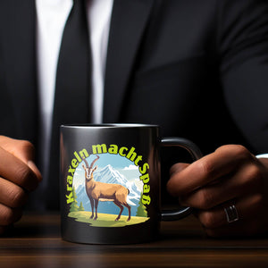 Steinbock Tasse in Schwarz mit Spruch: Kraxeln macht Spass