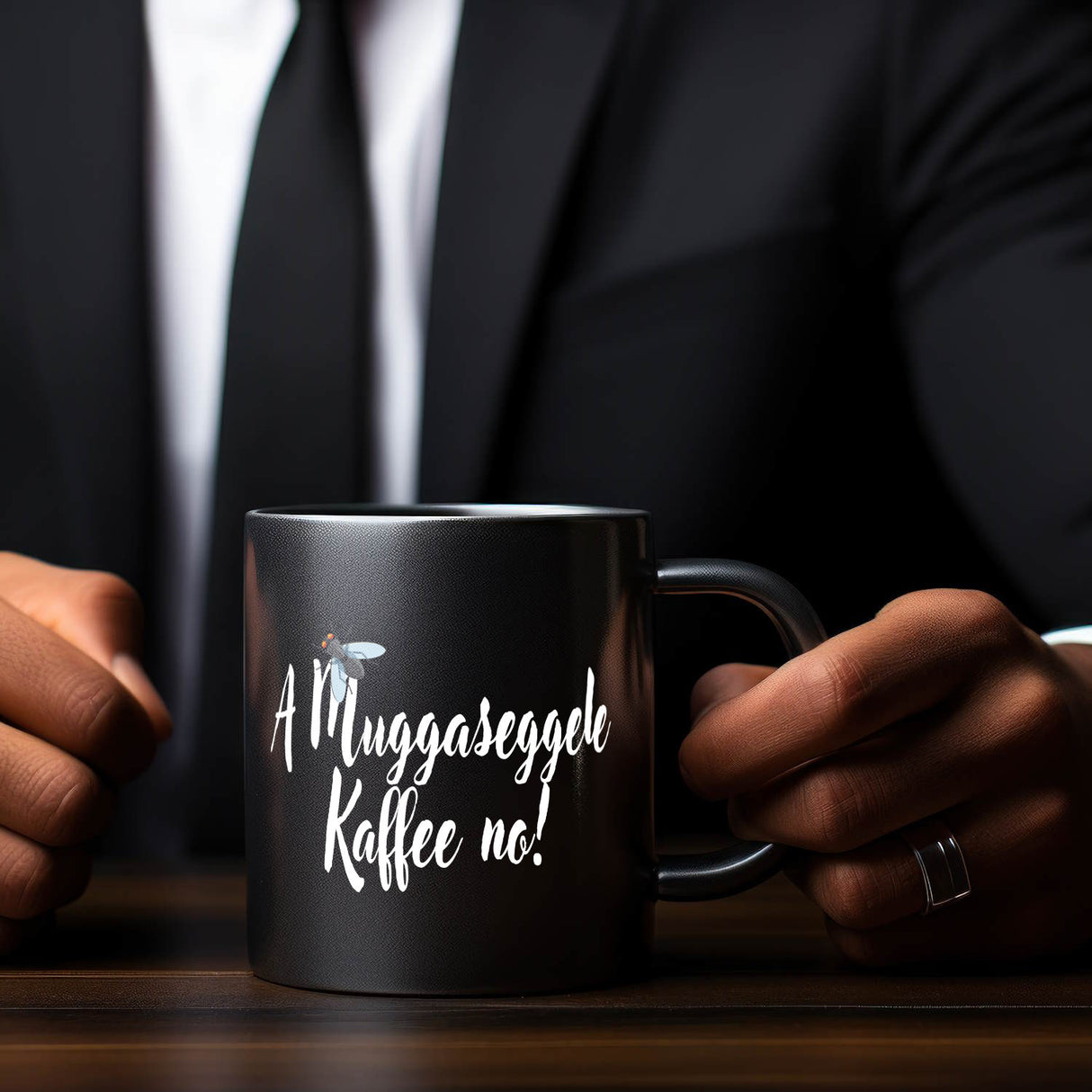 Schwaben Tasse in Schwarz mit Spruch: A Muggaseggele Kaffee no!