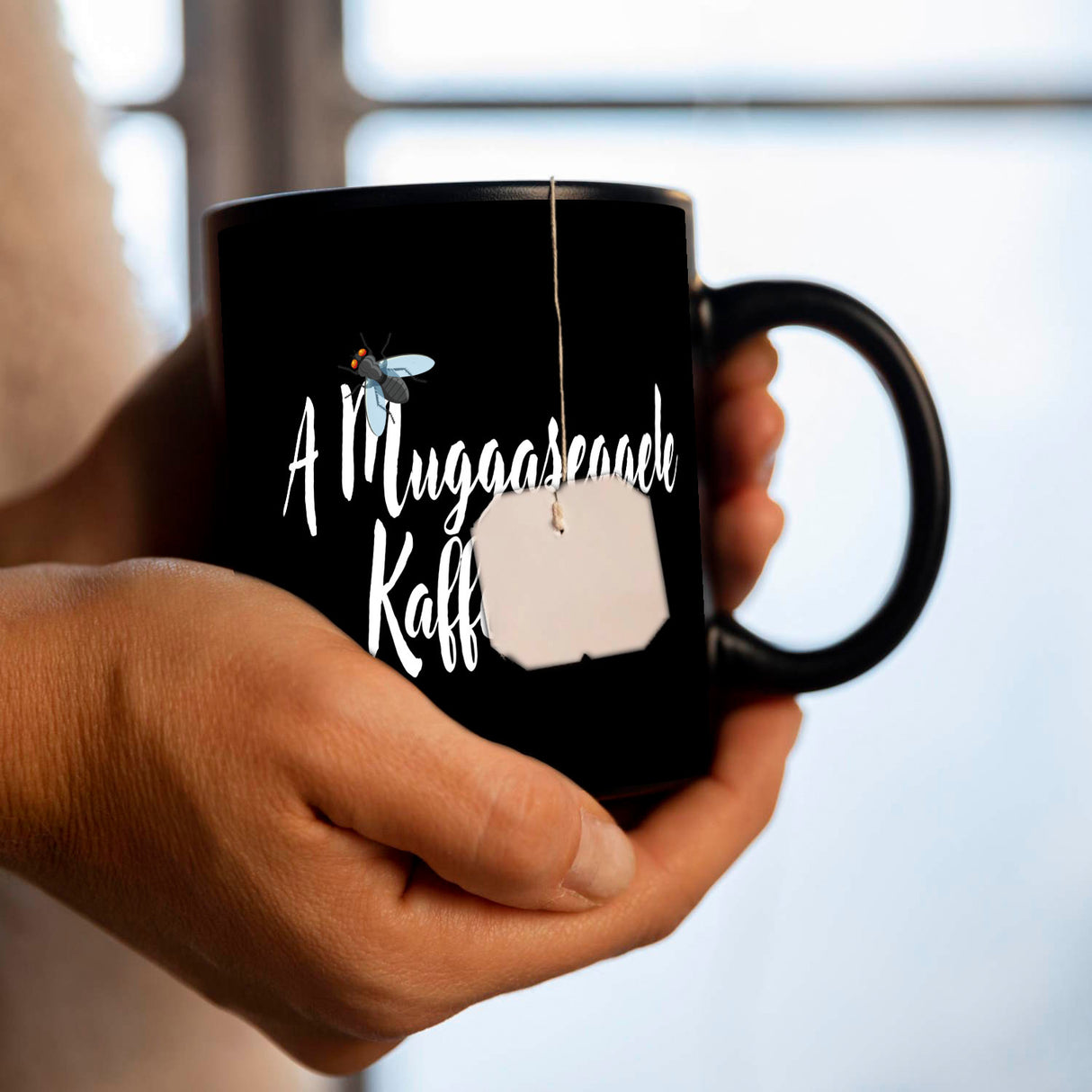 Schwaben Tasse in Schwarz mit Spruch: A Muggaseggele Kaffee no!
