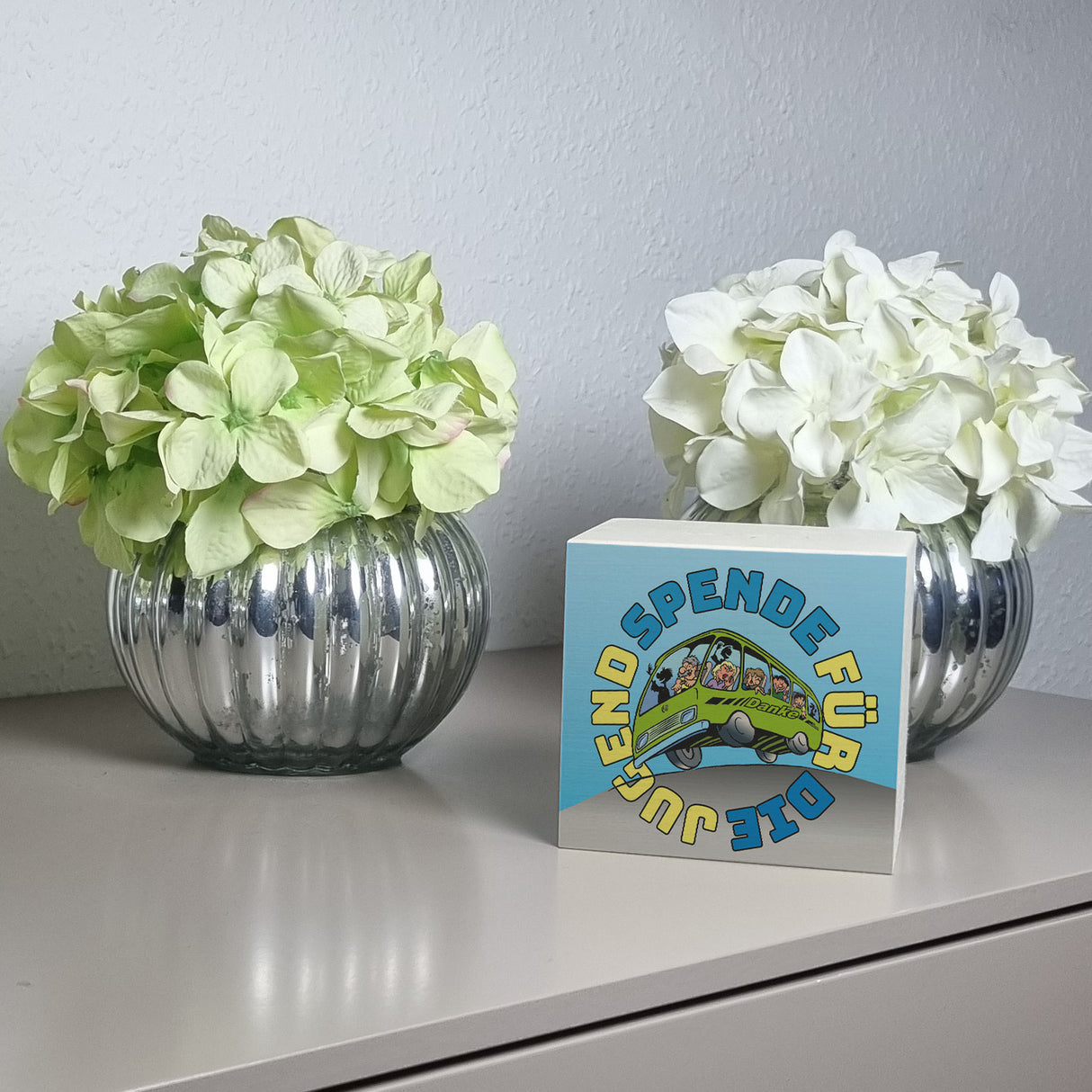 Omnibus Spardose mit Spruch: Spende für die Jugend. Danke