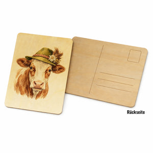 Kuh mit alpenländischem Trachtenhut Postkarte aus Holz