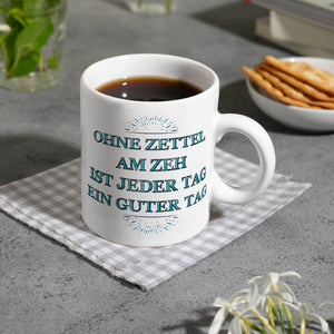 Kaffeebecher mit Spruch: Ohne Zettel am Zeh ist jeder Tag ...