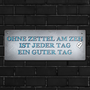 Metallschild mit Spruch: Ohne Zettel am Zeh ist jeder Tag ...