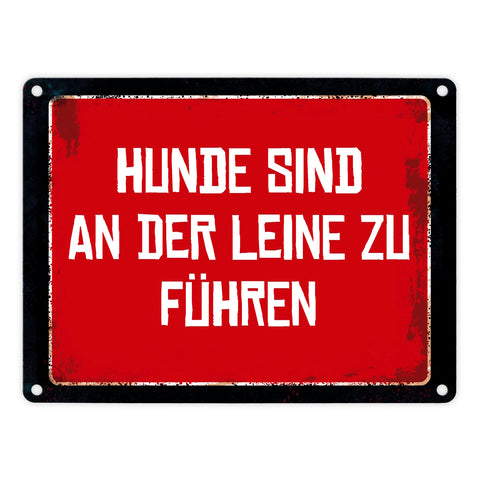 Hunde sind an der Leine zu führen Warn- und Hinweisschild im Used-Look