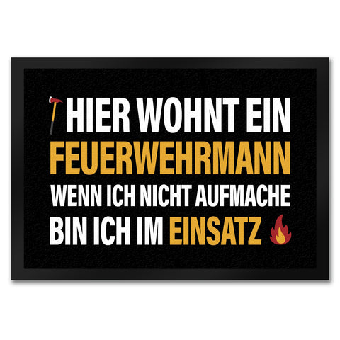 Hier wohnt ein Feuerwehrmann Fußmatte