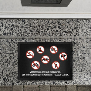 Verbotsschilder sind zu beachten Fußmatte
