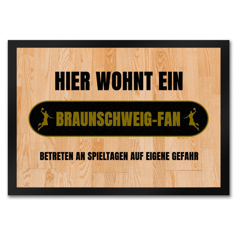 Hier wohnt ein Braunschweig-Fan Fußmatte in 35x50 cm mit Turnhallenboden Motiv