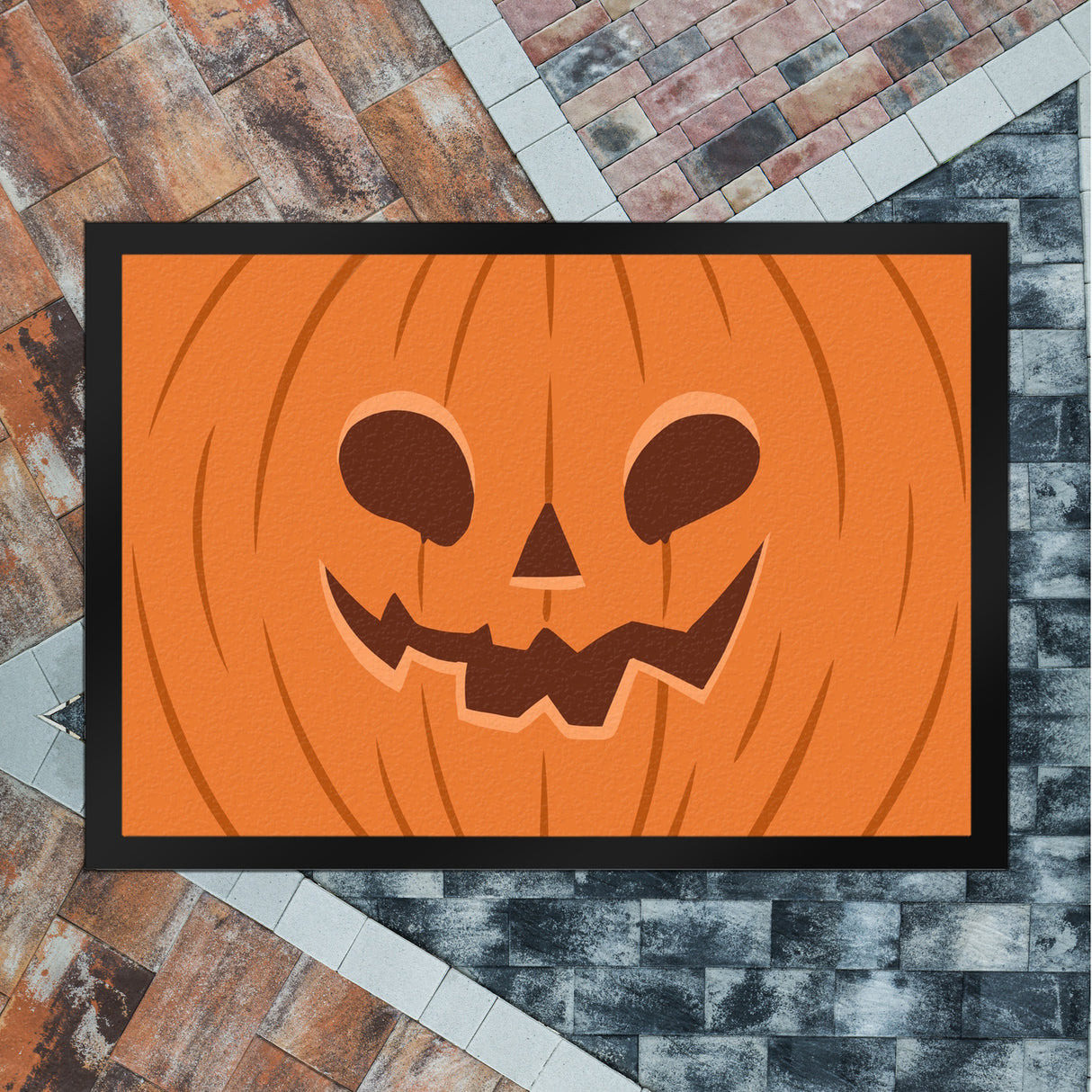 Fußmatte mit gruseligem Kürbiskopf Design für Halloween und die Herbstzeit