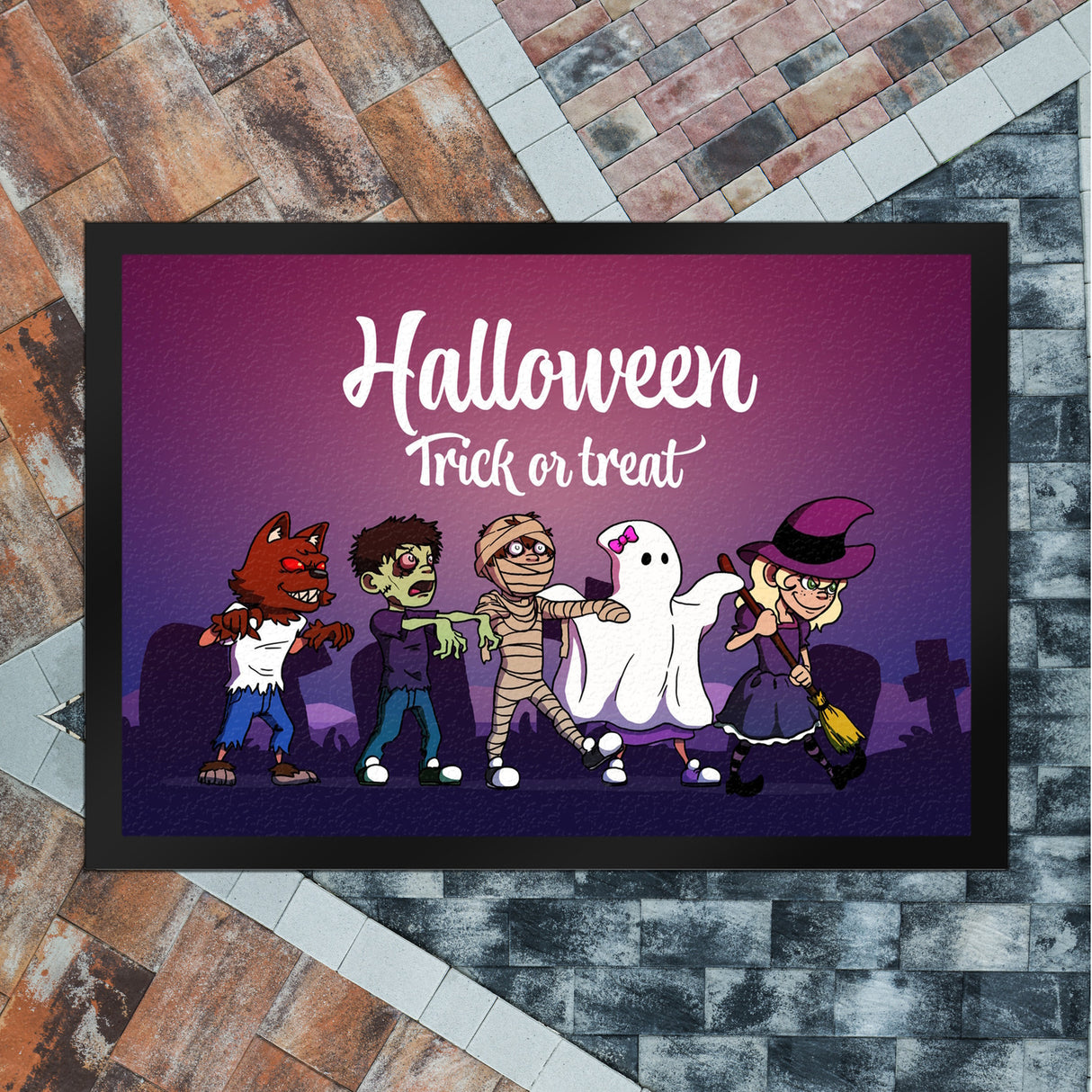 Fußmatte mit Halloween-Motiv, Spruch und kleinen Monstern