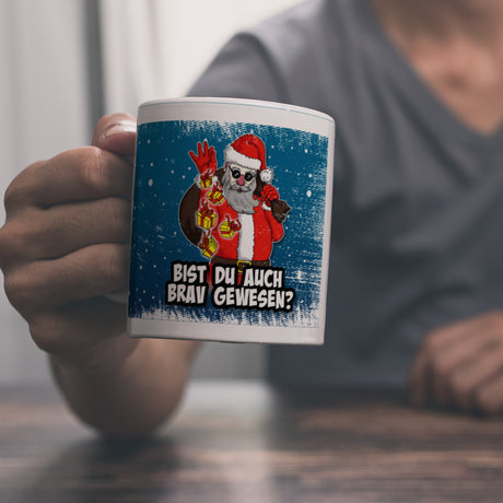 Bist du auch brav gewesen? Kaffeebecher mit coolem Weihnachtsmann