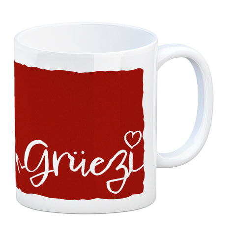 Kaffeebecher mit Grüezi-Schriftzug mit Herz und Bergen