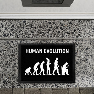 Human Evolution Fußmatte mit witzigem Motiv