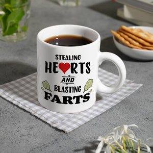 Stealing hearts and blasting farts Kaffeebecher