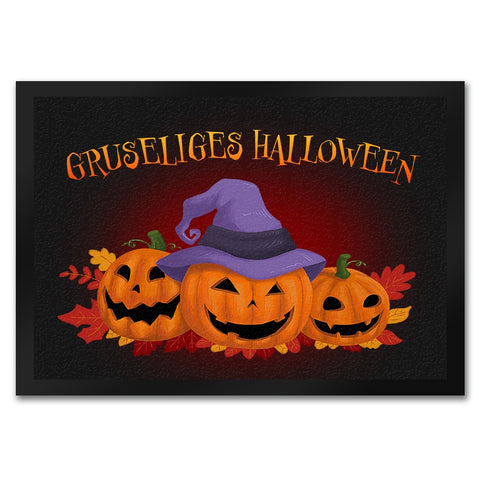Gruseliges Halloween Fußmatte mit hübschen Kürbissen