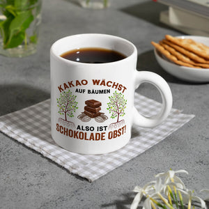 Kakao Kaffeebecher mit Spruch Schokolade ist Obst