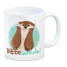 Lachender Otter Kaffeebecher mit Spruch Bitte lächeln