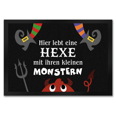 Monster Fußmatte in 35x50 cm mit Spruch Hier lebt eine Hexe